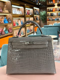Hermes | Kelly (25) – Crocodile – Gris T (Grey) – Palladium Hardware