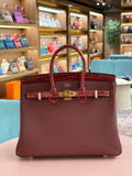 Hermes | Birkin Touch (25) – Togo – Rouge H – Gold Hardware
